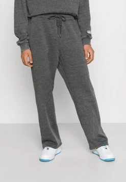 Mennace RECLAIM JOGGER UNISEX - Tracksuit Bottoms - Washed Black