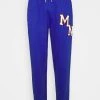 Mennace UNISEX BADGE - Tracksuit Bottoms - Blue 2 Mennace UNISEX BADGE - Tracksuit Bottoms - Blue -Mennace Shop Online 27468e679152482782a552926efa3b8b