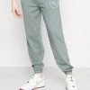 MENNACE ESSENTIAL REGULAR UNISEX - Tracksuit Bottoms - Teal 1 MENNACE ESSENTIAL REGULAR UNISEX - Tracksuit Bottoms - Teal -Mennace Shop Online 2f7b6dcc50ee42db9203f7495ab1c7ac