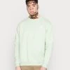 MENNACE UNISEX WASHED REGULAR - Sweatshirt - Light Green 1 MENNACE UNISEX WASHED REGULAR - Sweatshirt - Light Green -Mennace Shop Online 3567210fb8c94162ad3e9ae12e6b517b