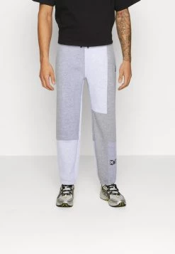 Mennace CUT SEW PATCHWORK JOGGER - Tracksuit Bottoms - Grey