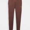 Mennace ESSENTIAL REGULAR JOGGER - Tracksuit Bottoms - Brown 1 Mennace ESSENTIAL REGULAR JOGGER - Tracksuit Bottoms - Brown -Mennace Shop Online 6587fed854874c4697f3a03e35c7d5c3
