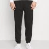 Mennace ESSENTIAL REGULAR JOGGER UNISEX - Tracksuit Bottoms - Black -Mennace Shop Online 75223c85f1f0471694acaed38a3e8d18