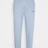 Mennace CLUB JOGGER UNISEX - Tracksuit Bottoms - Light Blue -Mennace Shop Online a13f0c6a340c4c099875de09df0f6dda