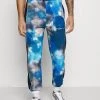 Mennace TIE DYE UNISEX - Tracksuit Bottoms - Blue 2 Mennace TIE DYE UNISEX - Tracksuit Bottoms - Blue -Mennace Shop Online fbf2310324a443f89c07b090f3412aaf